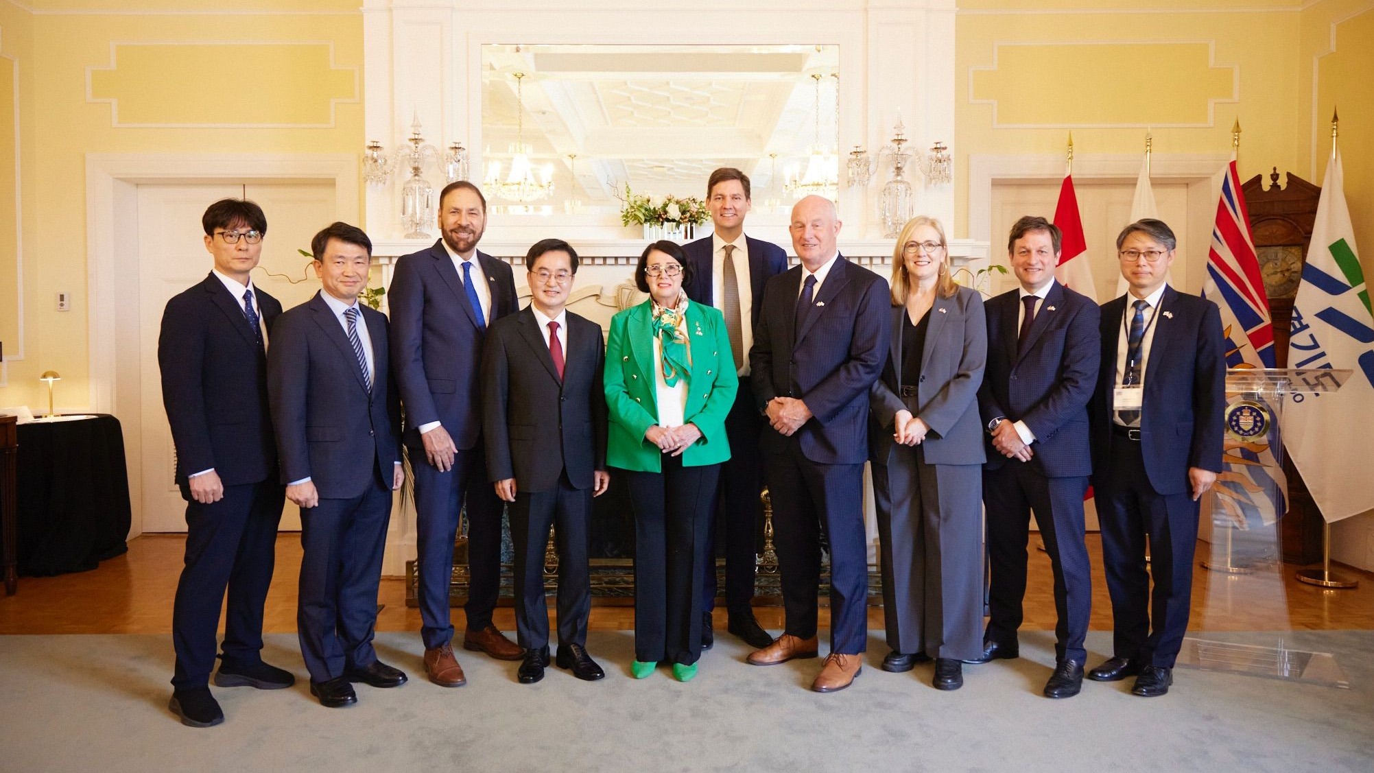 Several government officials including the Minister of JEDI and Minister of State for Trades and Premiere David Eby standing with Governor Kim from South Korea.